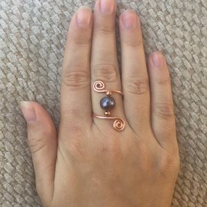 Elvish style copper wire wrapped ring with pearl.